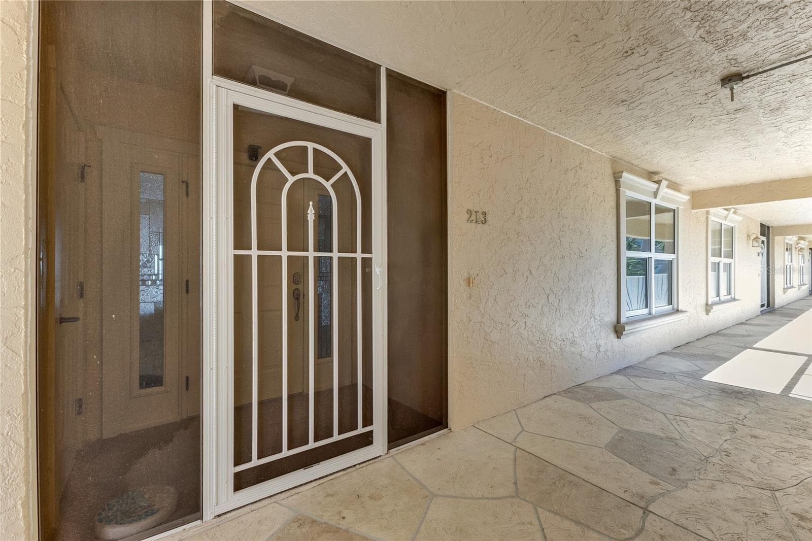 Screened entrance - 101 N MARION CT #213, PUNTA GORDA