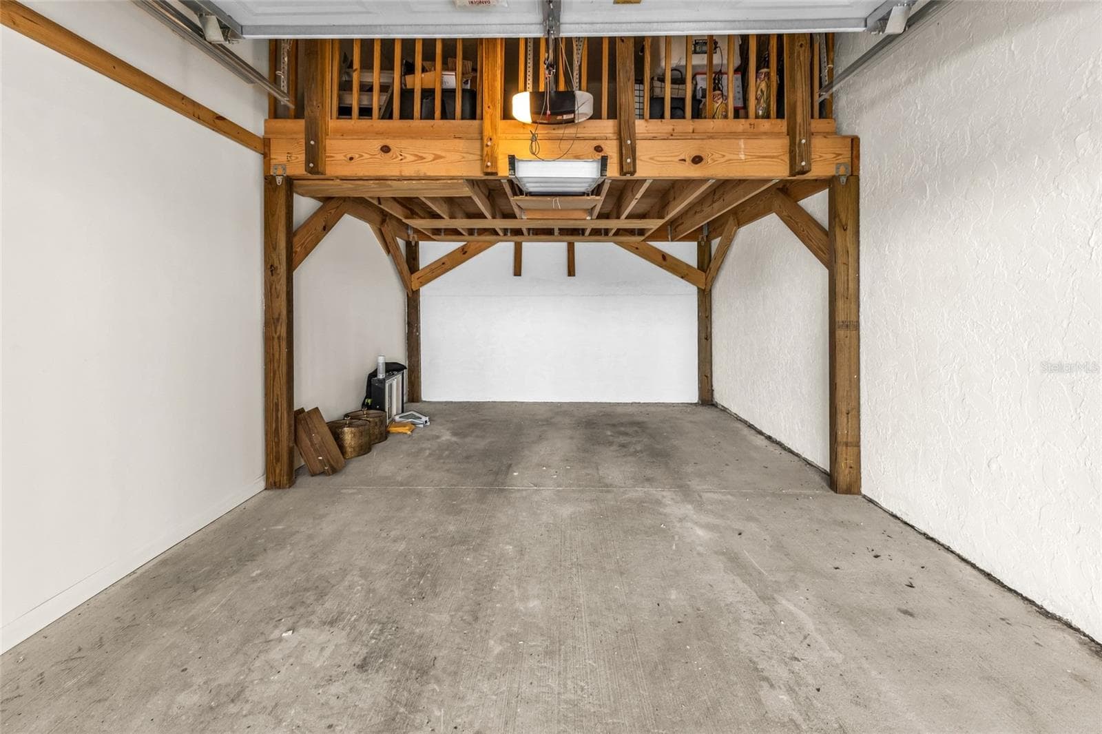 Garage F. 12' 3" wide and 20' 0" deep with storage platform 12' 3" x 10' 0" - 101 N MARION CT #213, PUNTA GORDA