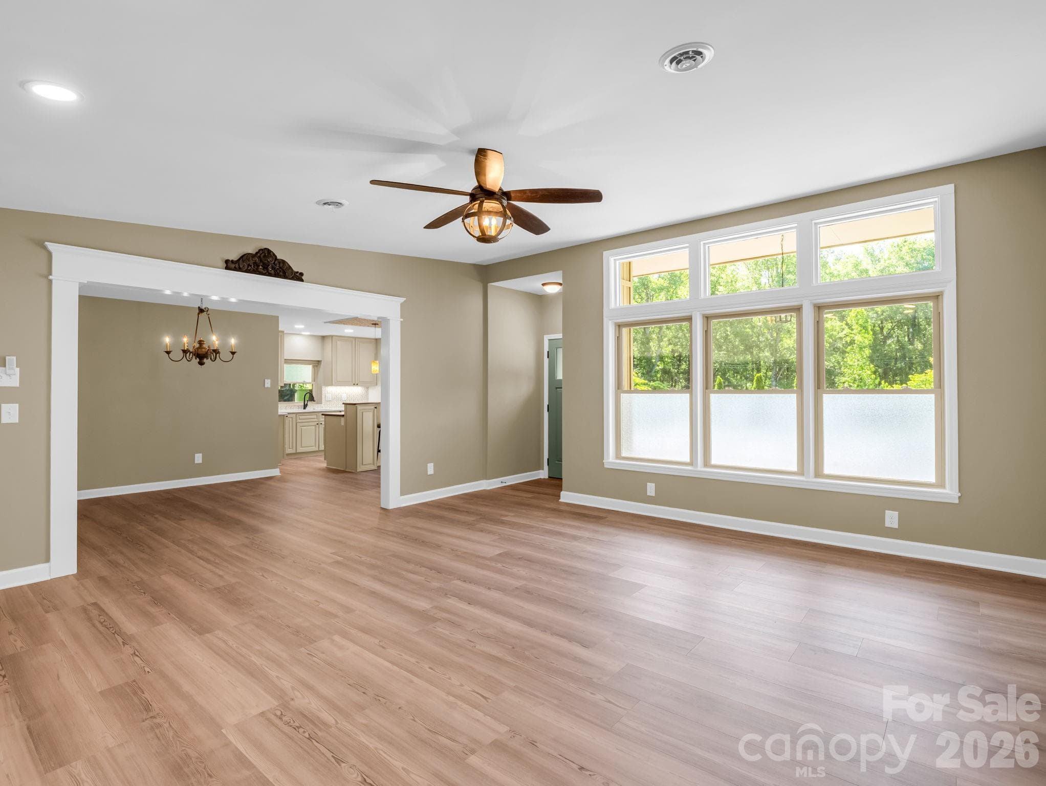 This view is from the living room to the dining area and beyond to the kitchen. - 44 Jervey Road, Tryon