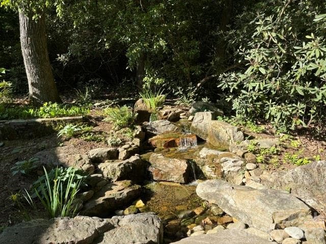 Outdoor water feature provides soothing sounds - 100 Elmridge Drive, Flat Rock