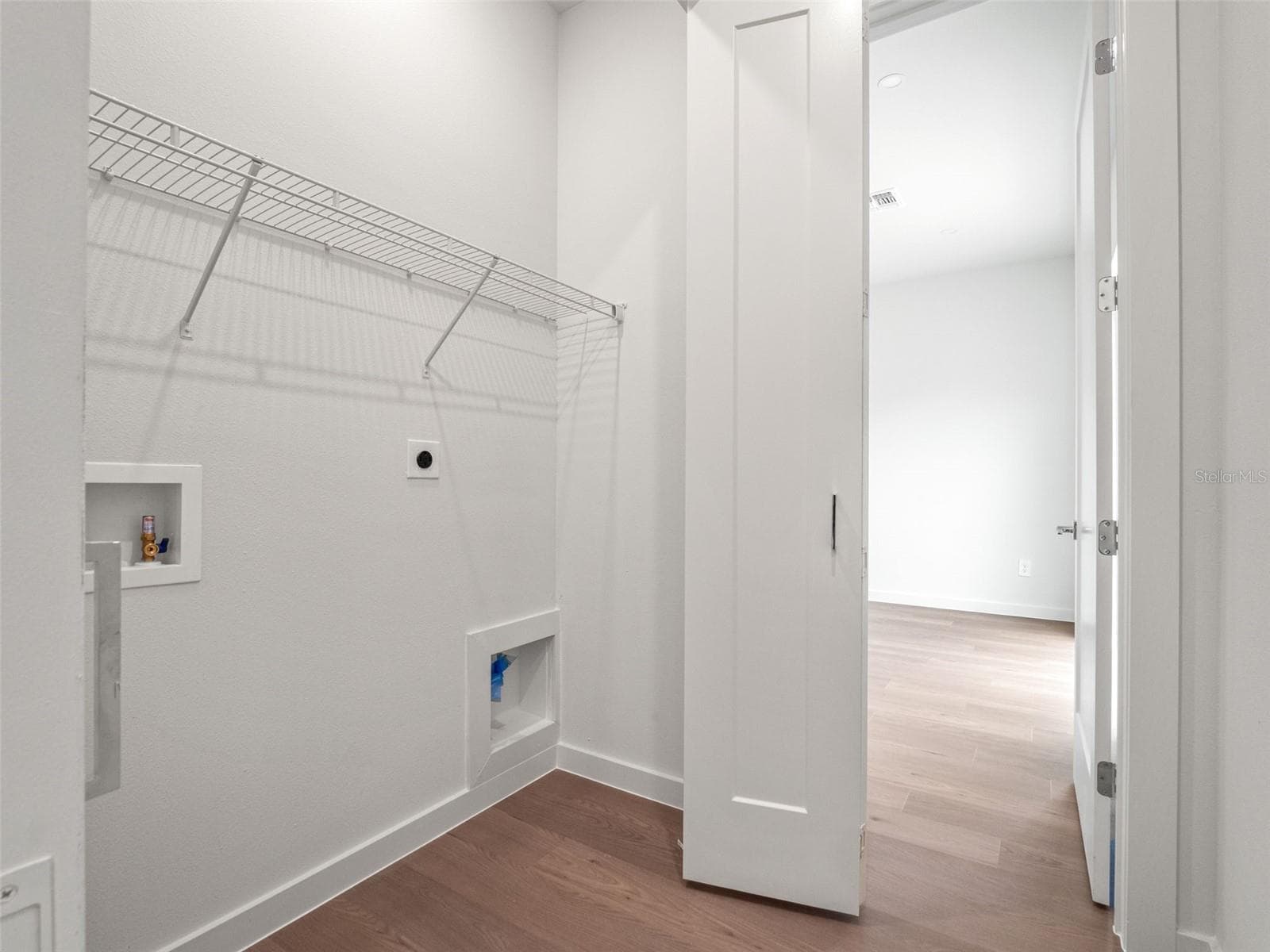 Laundry Closet - 454 SKYFIELD CT, LADY LAKE