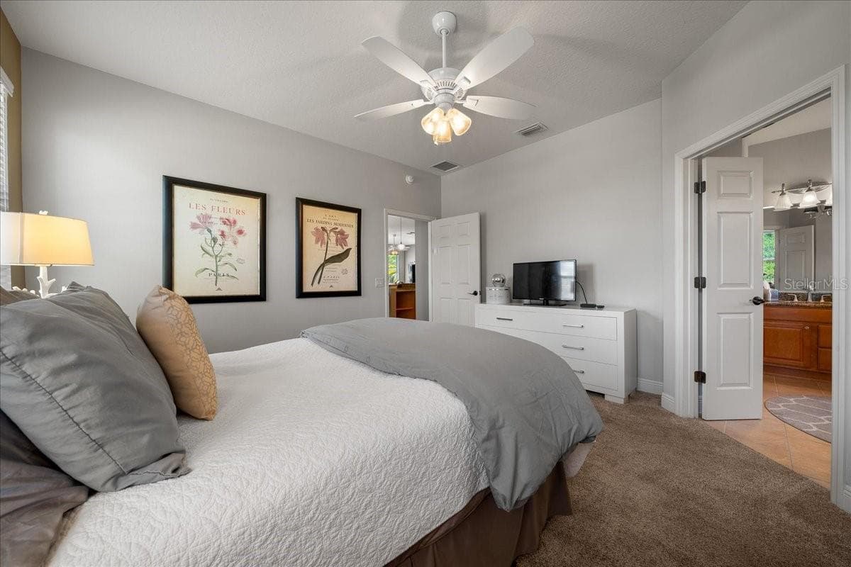 Primary Bedroom Features Double Doors to Ensuite - 1606 SNELLING AVE, THE VILLAGES
