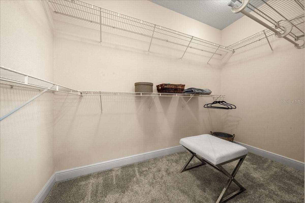 Primary Bedroom Walk-In Closet - 1606 SNELLING AVE, THE VILLAGES