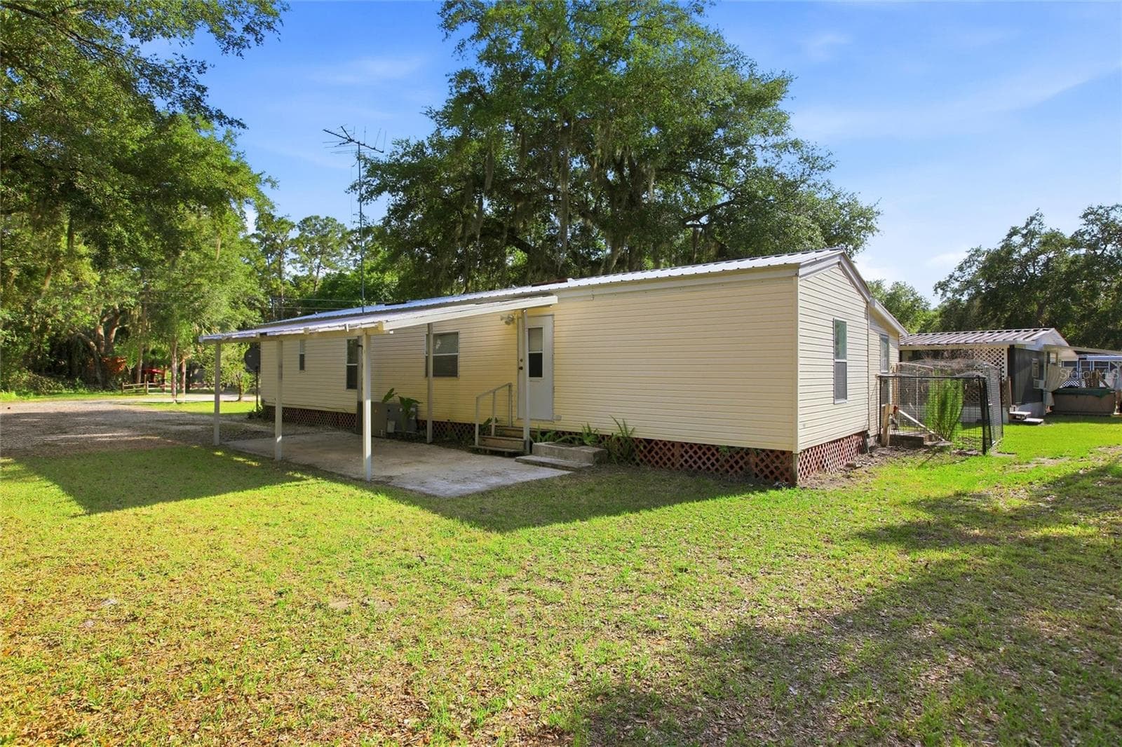 Manufactured Home at 3348 OMEC ST, LAKE WALES, photo 4 of 63