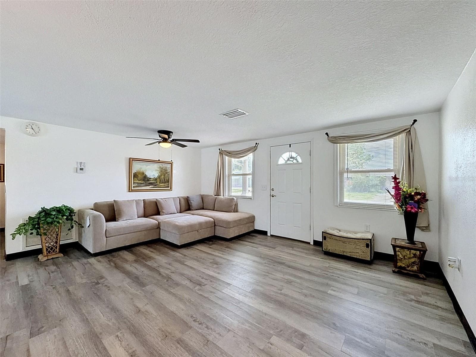 Freshly painted with luxury vinyl plank flooring. - 12735 1ST ISLE, HUDSON