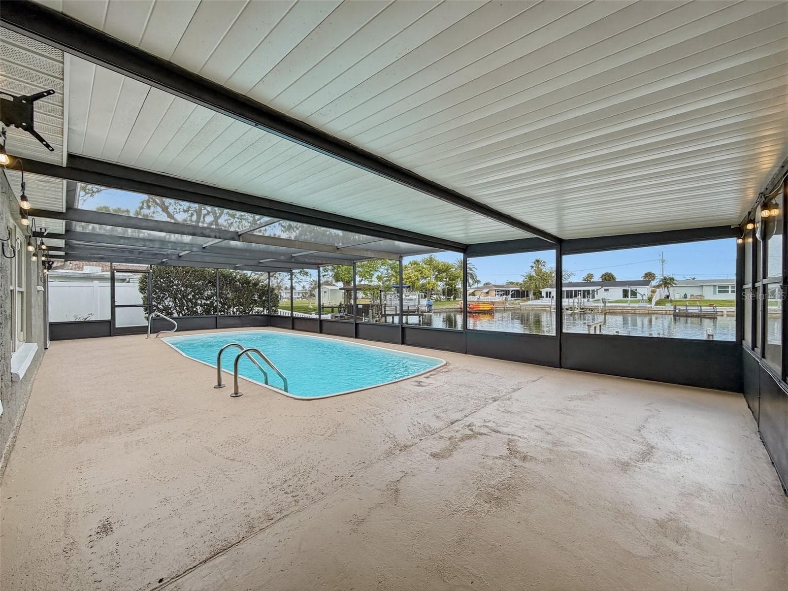 Spacious pool deck with plenty of room for entertaining. - 12735 1ST ISLE, HUDSON