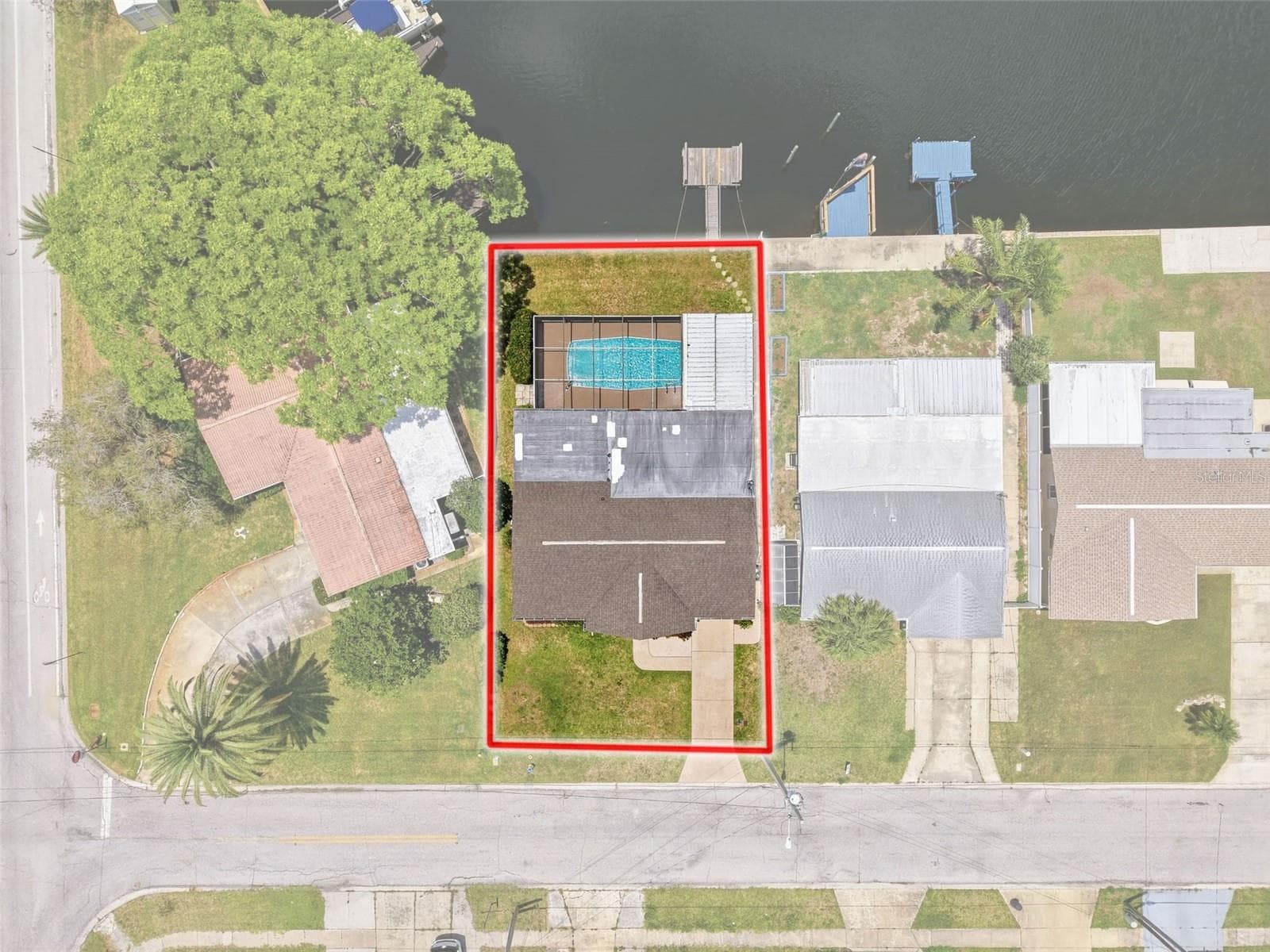 Drone photo provides a helpful overview of the property boundaries. - 12735 1ST ISLE, HUDSON