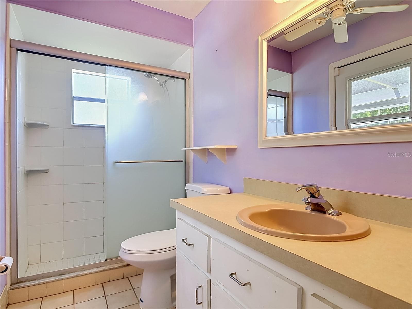 ensuite bathroom with door to pool - 1237 JEFFERY DR, PORT ORANGE