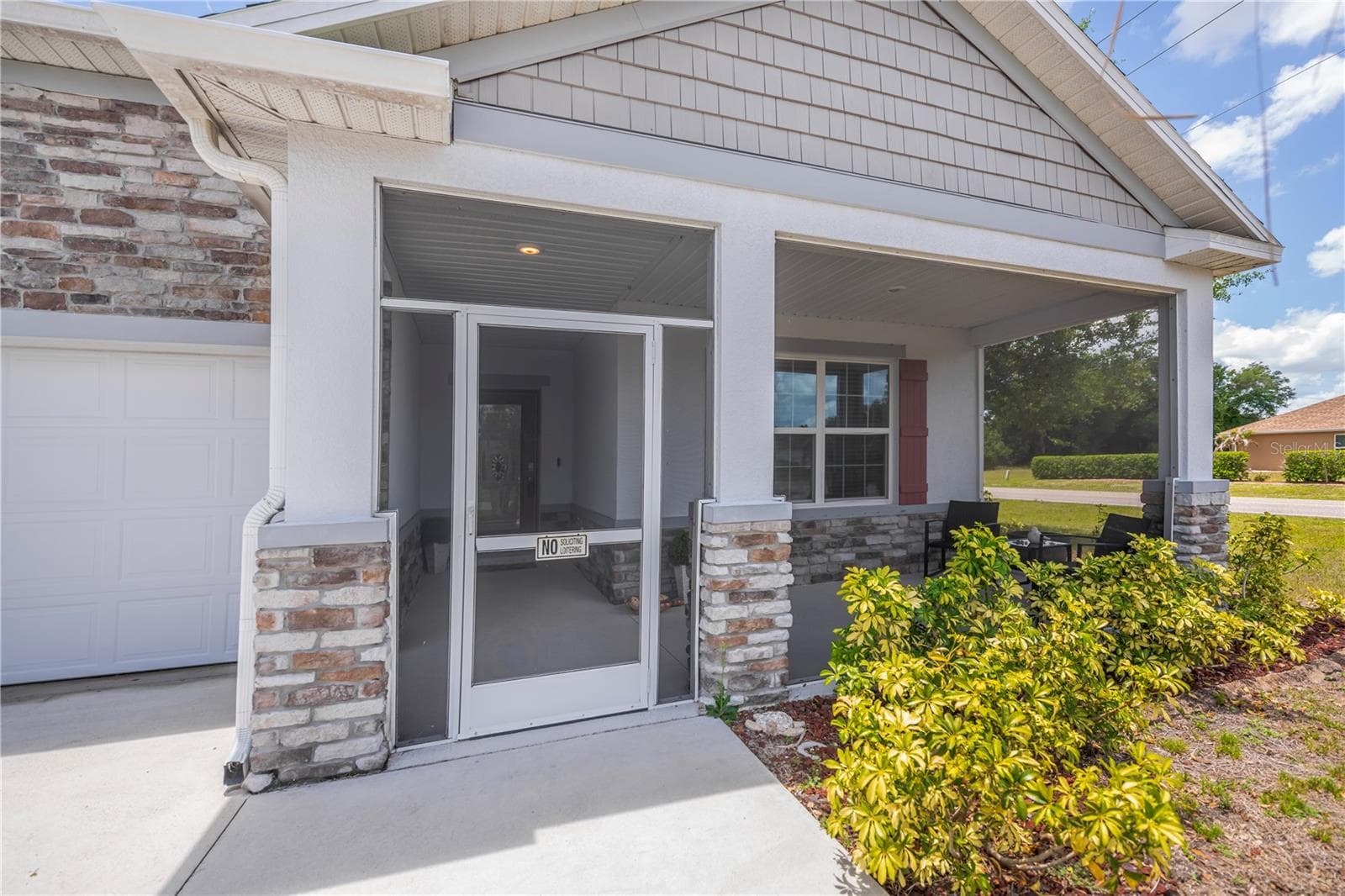 Screened Front Entry with Stone Accents. - 640 ENCARNACION ST, PUNTA GORDA
