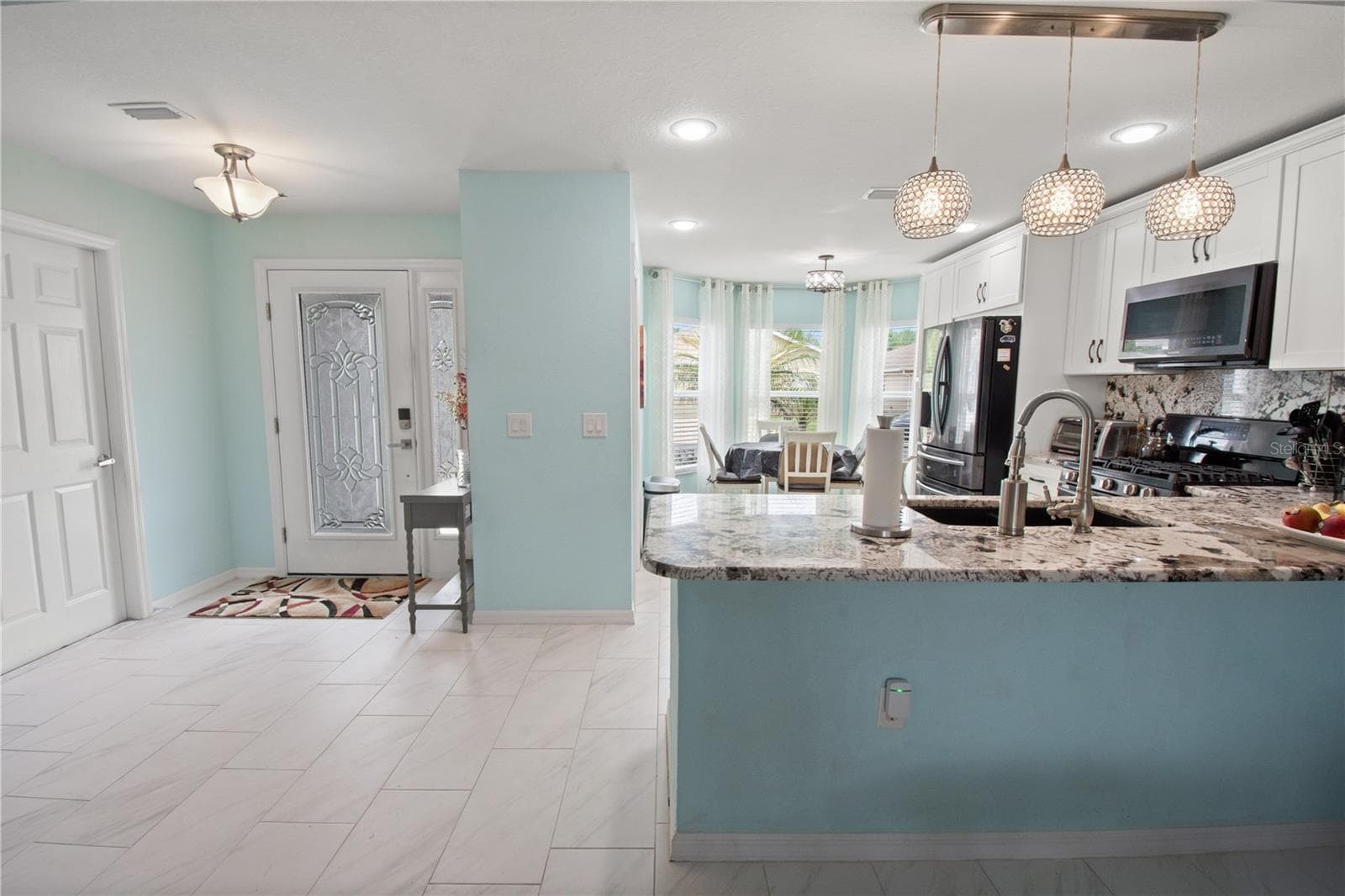 Foyer / Kitchen - 241 LOURDES ST, LAKE WALES