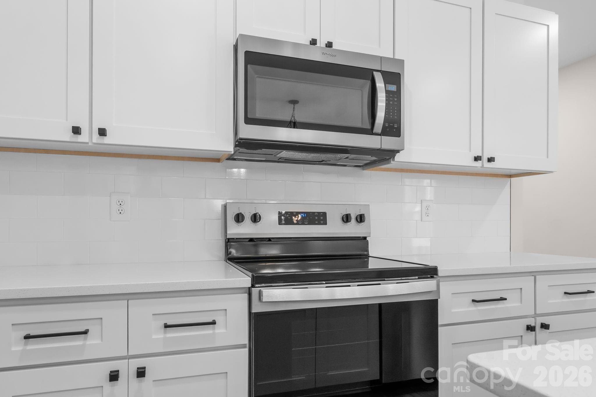 Subway backsplash and stainless appliances - 2123 Woodhurst Lane, Albemarle