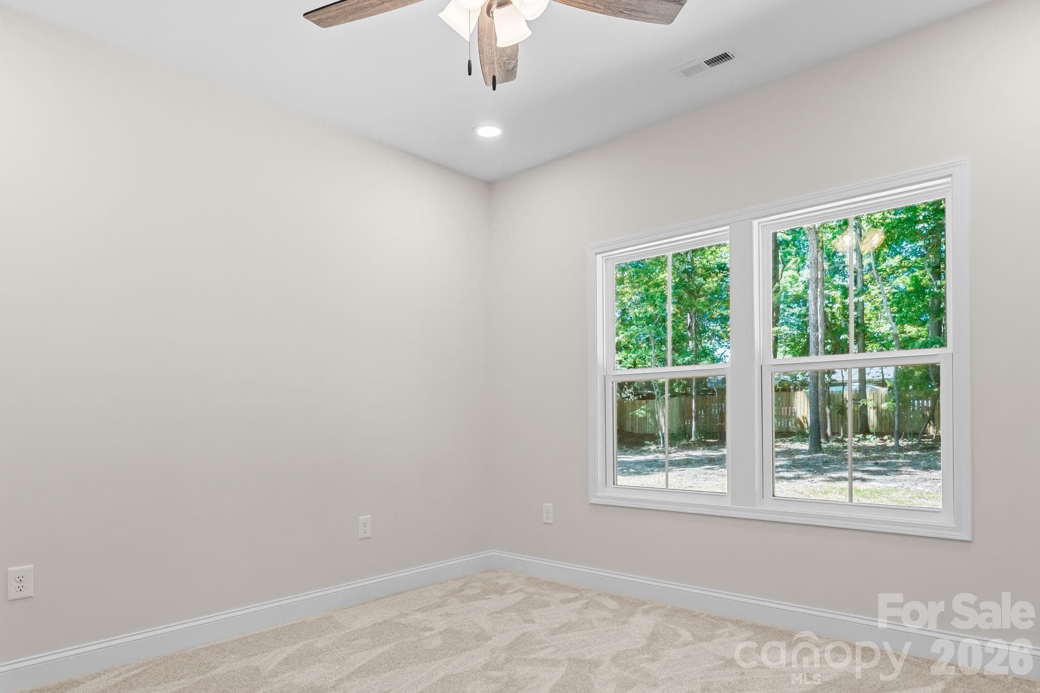 Primary Bedroom with ceiling fan - 2123 Woodhurst Lane, Albemarle