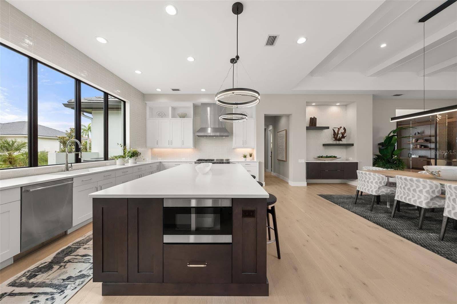 There is a Sharp microwave drawer hidden in the island. - 11721 RIVE ISLE RUN, PARRISH