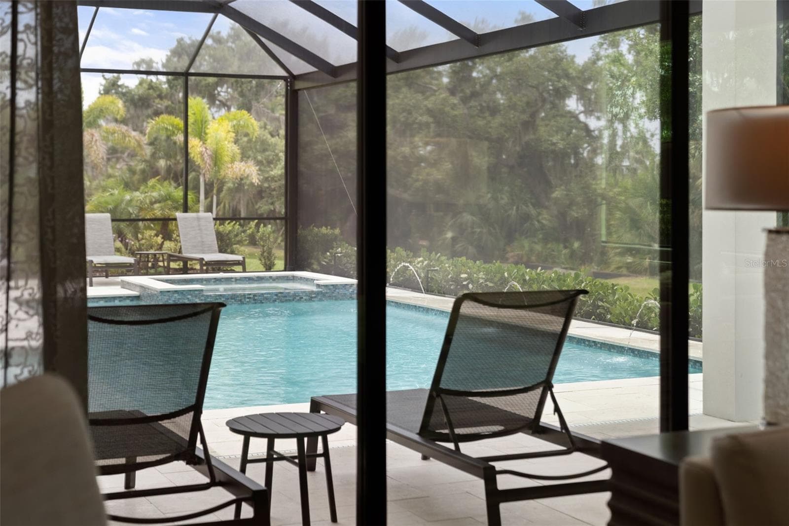 You can access the pool/spa and lanai from the bonus room. - 11721 RIVE ISLE RUN, PARRISH
