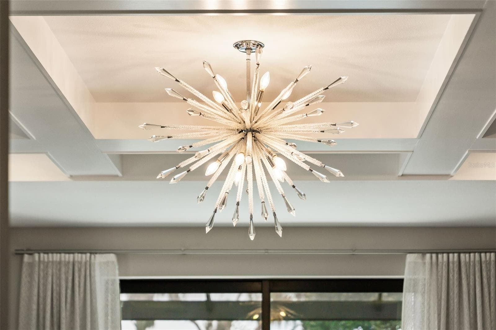 The Rousseau Articulating Chandelier accents the primary bedroom. - 11721 RIVE ISLE RUN, PARRISH