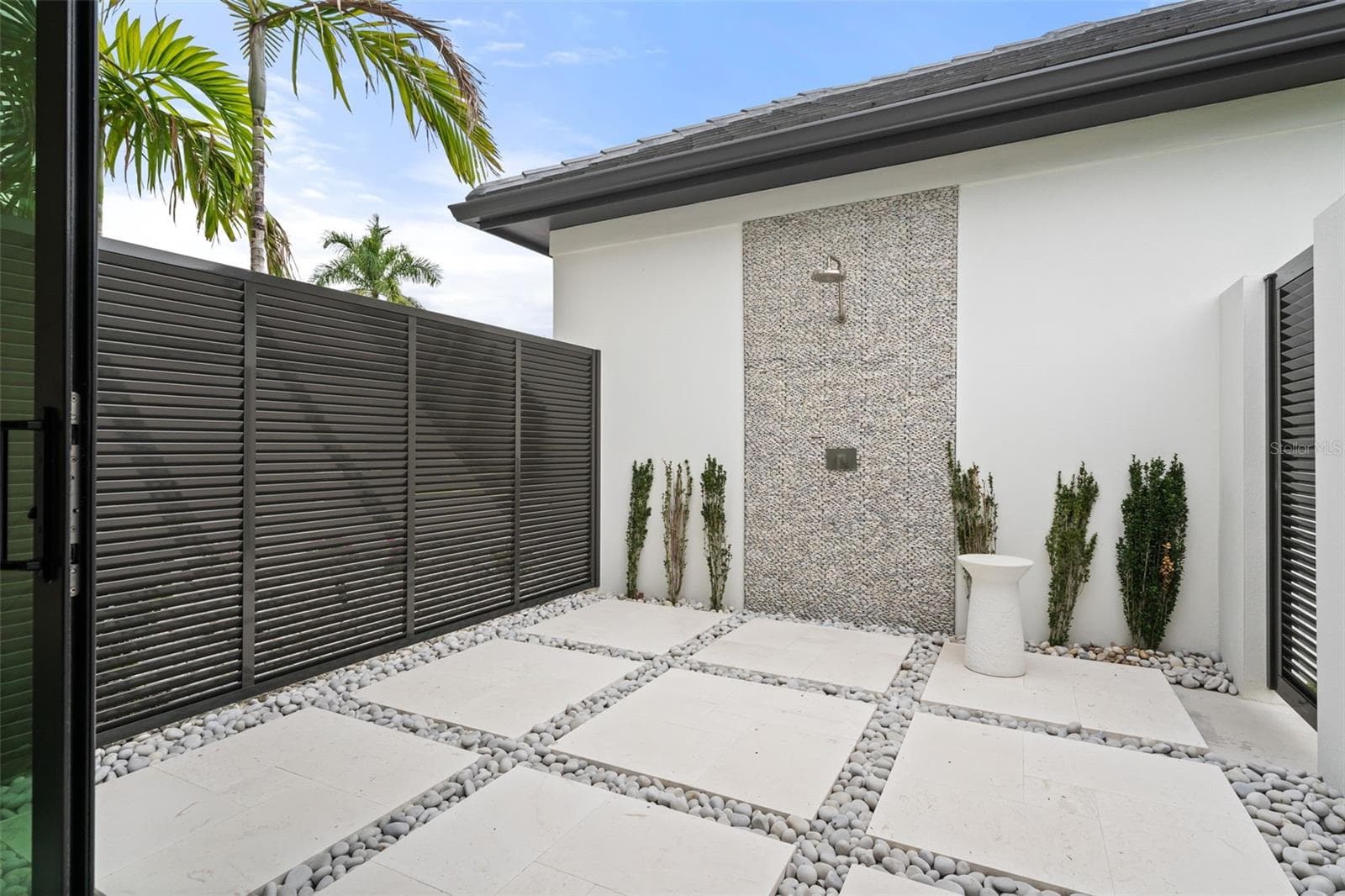 The patio is big enough for a cold plunge or sauna! - 11721 RIVE ISLE RUN, PARRISH