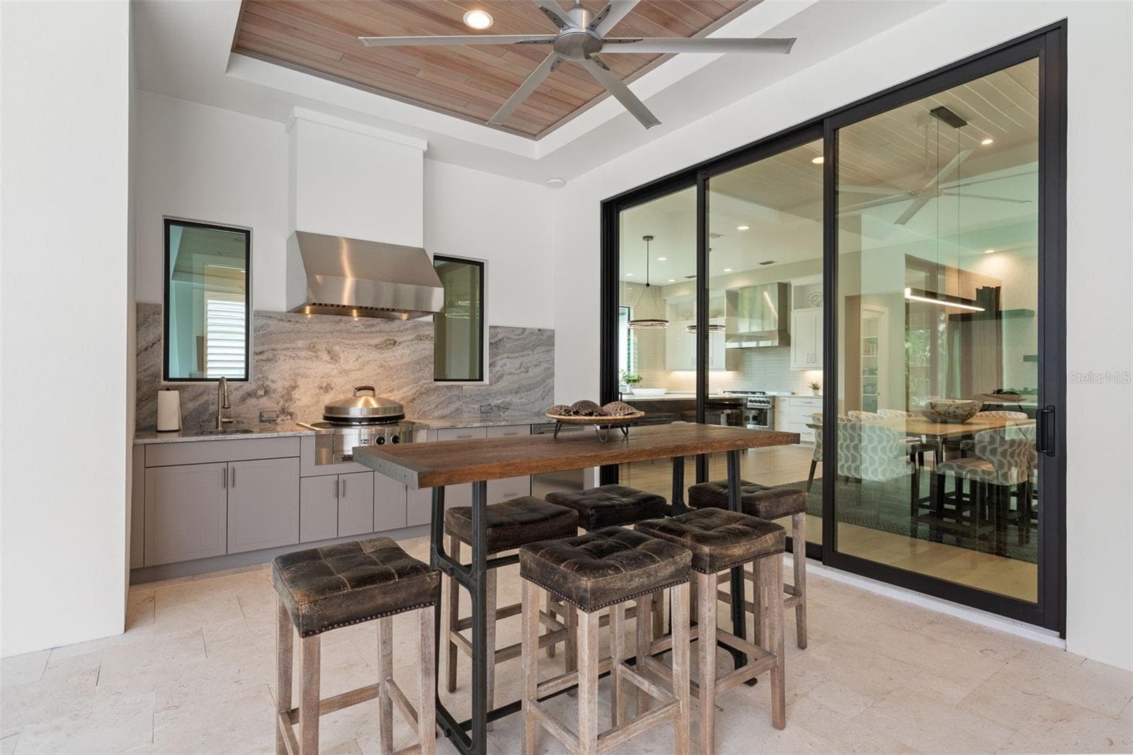 There are several spaces on the covered lanai to relax or entertain. - 11721 RIVE ISLE RUN, PARRISH