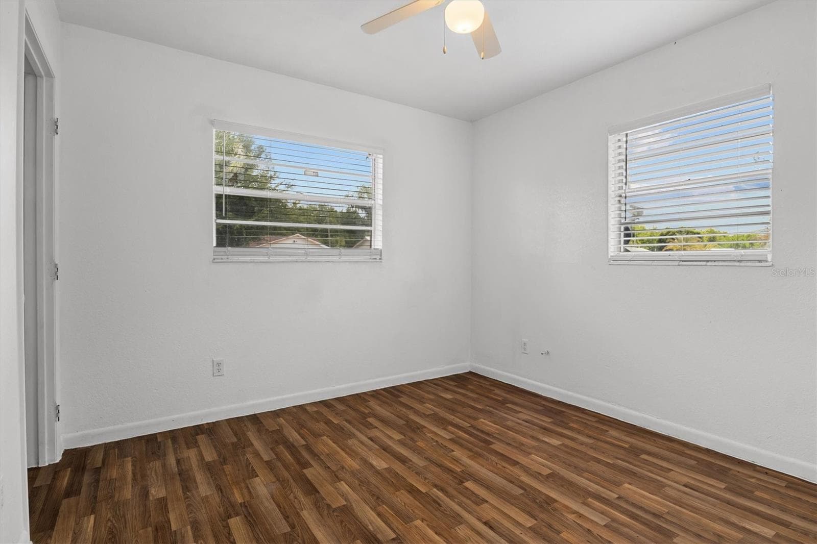 Bedroom 3 with luxury vinyl plank flooring - 844 CHAMBERLAIN BLVD, WAUCHULA