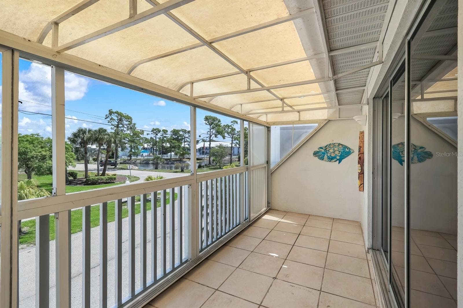 Balcony/Lanai from Living Room - 6800 PLACIDA RD #TH13, ENGLEWOOD