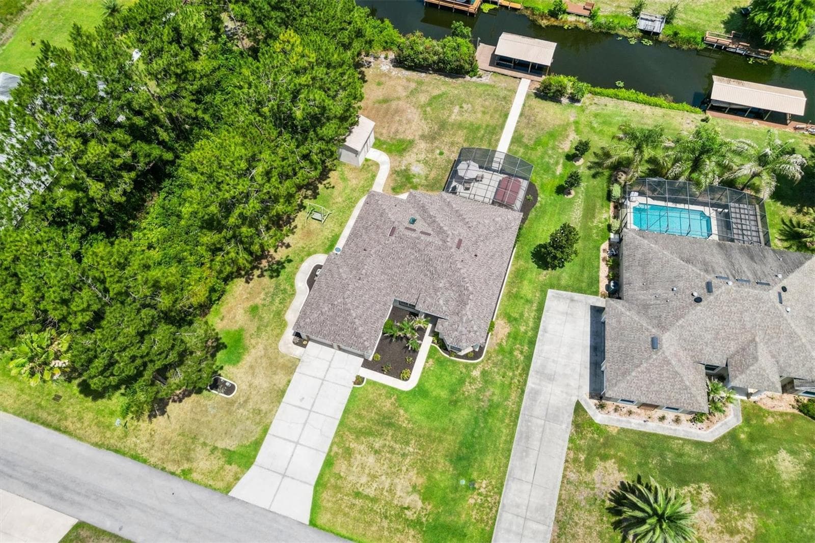 Located just three homes from the mouth of Lake Eustis, offering quick and convenient access to the Harris Chain of Lakes and endless boating adventures. - 12107 EAGLE POINT CT, LEESBURG