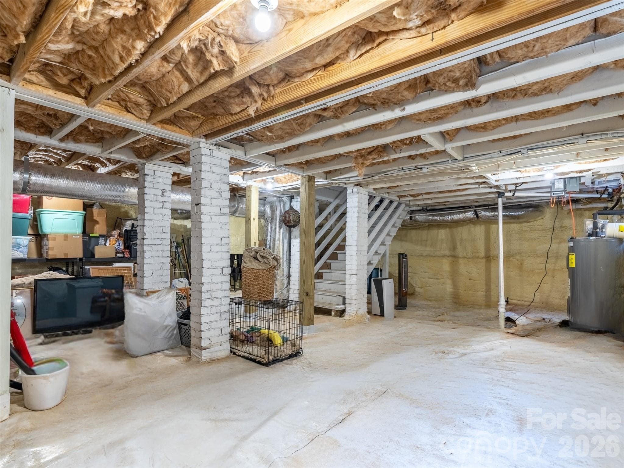 Basement offers additional storage or room for future expansion. - Asheville