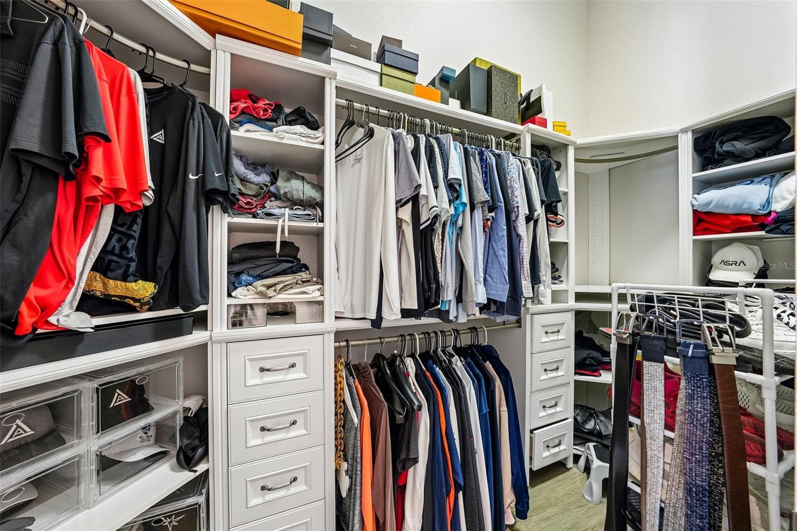 Primary bedroom walk-in closet - 9039 WATERASH LN N, PINELLAS PARK