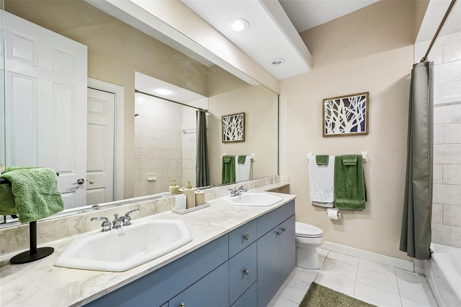 Third bathroom with tub located upstairs - 9039 WATERASH LN N, PINELLAS PARK