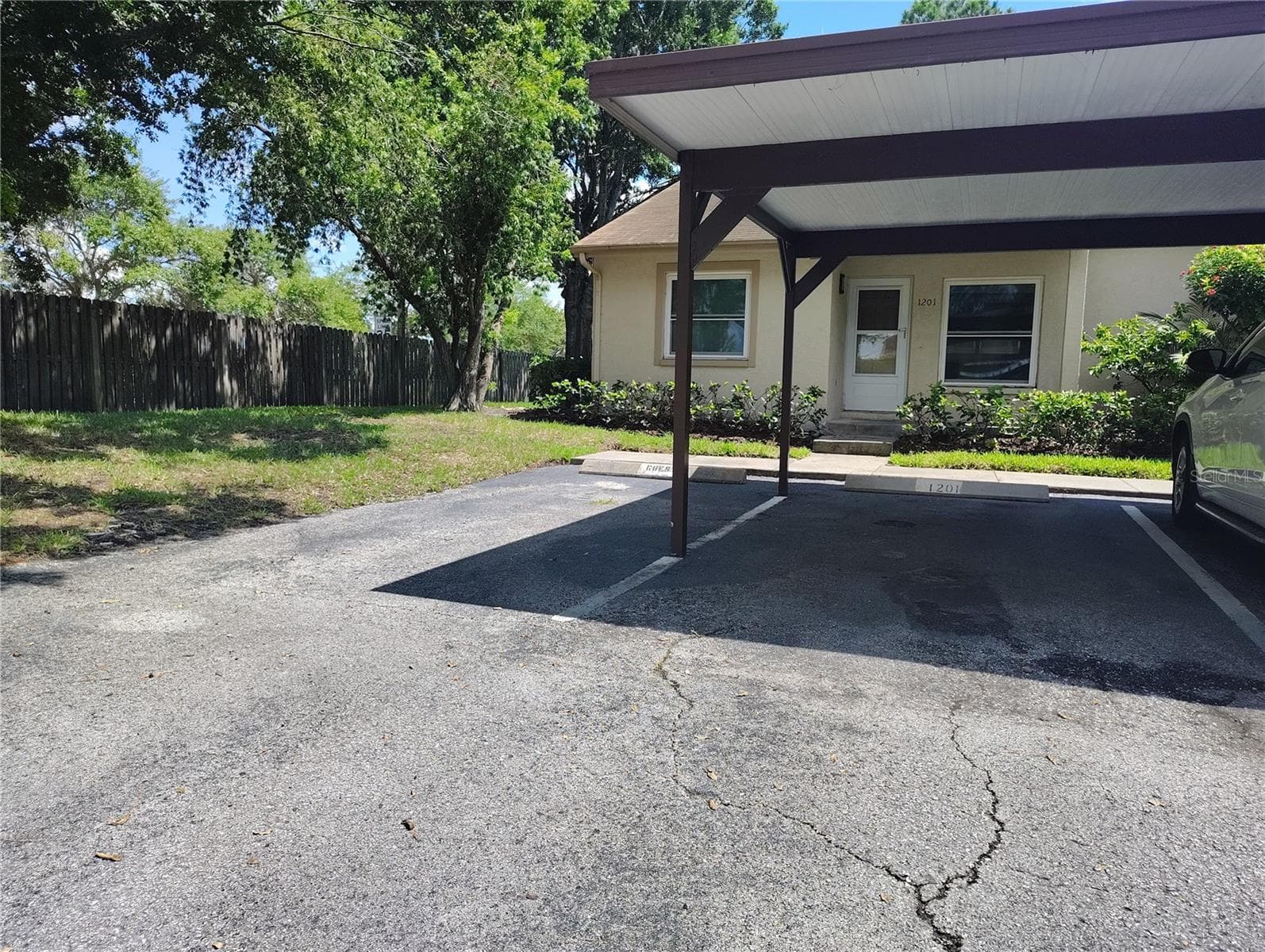 Covered parking and guest space - 10853 43RD ST N #1201, CLEARWATER
