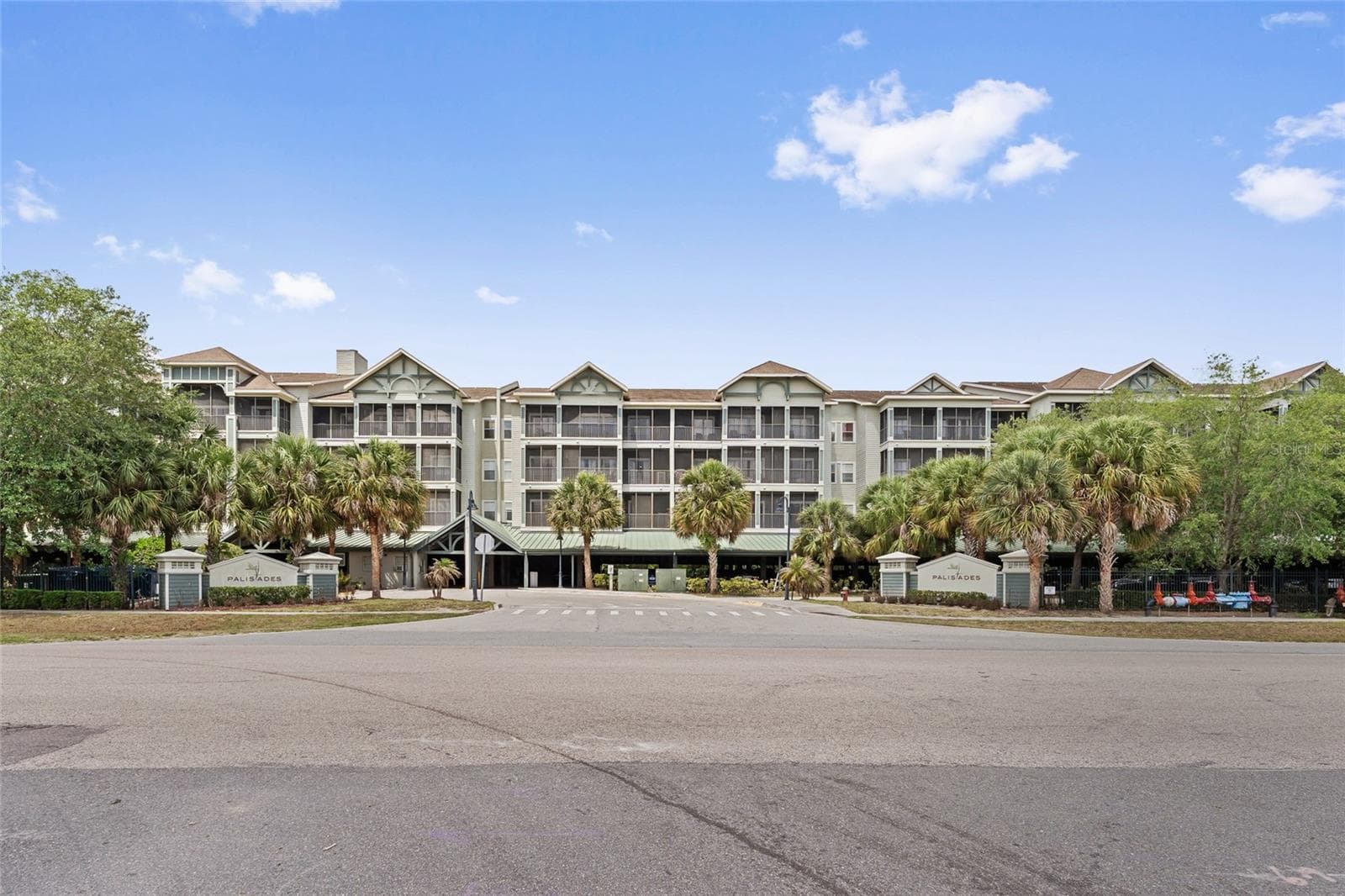 Building facade and parking entrance (all covered parking) - 14200 AVALON RD #409, WINTER GARDEN