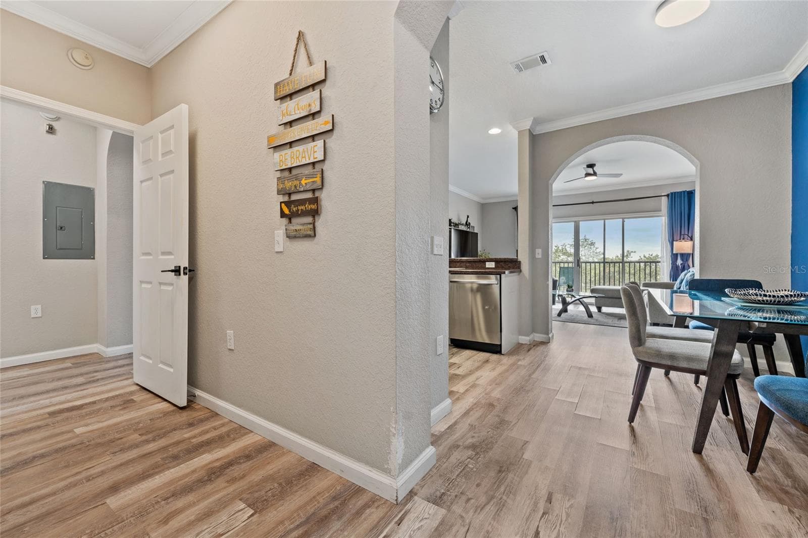 Bedroom 2 and laundry closet to left, kitchen straight ahead - 14200 AVALON RD #409, WINTER GARDEN