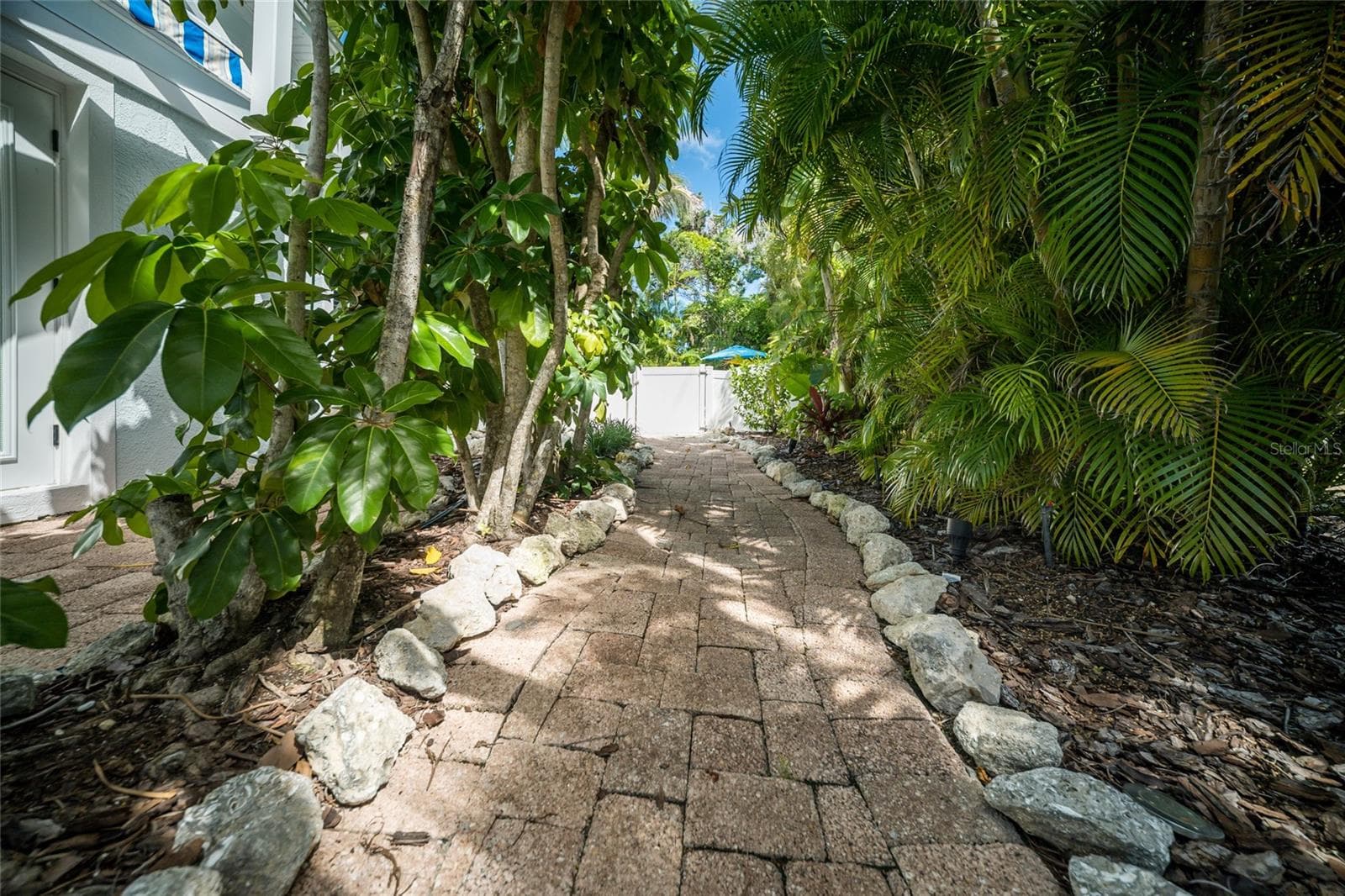 Paved walkway to the front door - 324 64TH ST, HOLMES BEACH