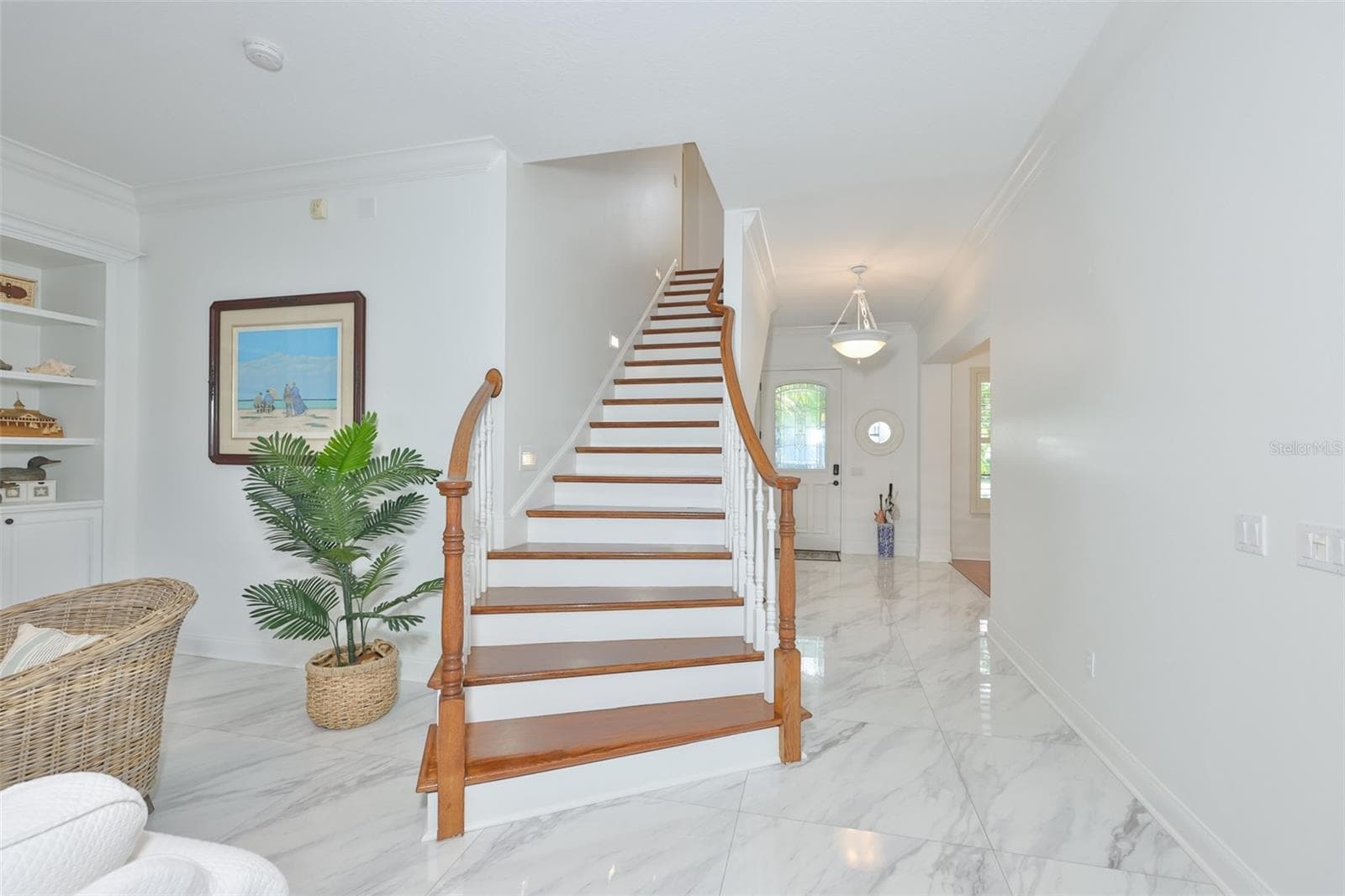 highly-polished wood floor staircase - 5318 LOON NEST CT, APOLLO BEACH