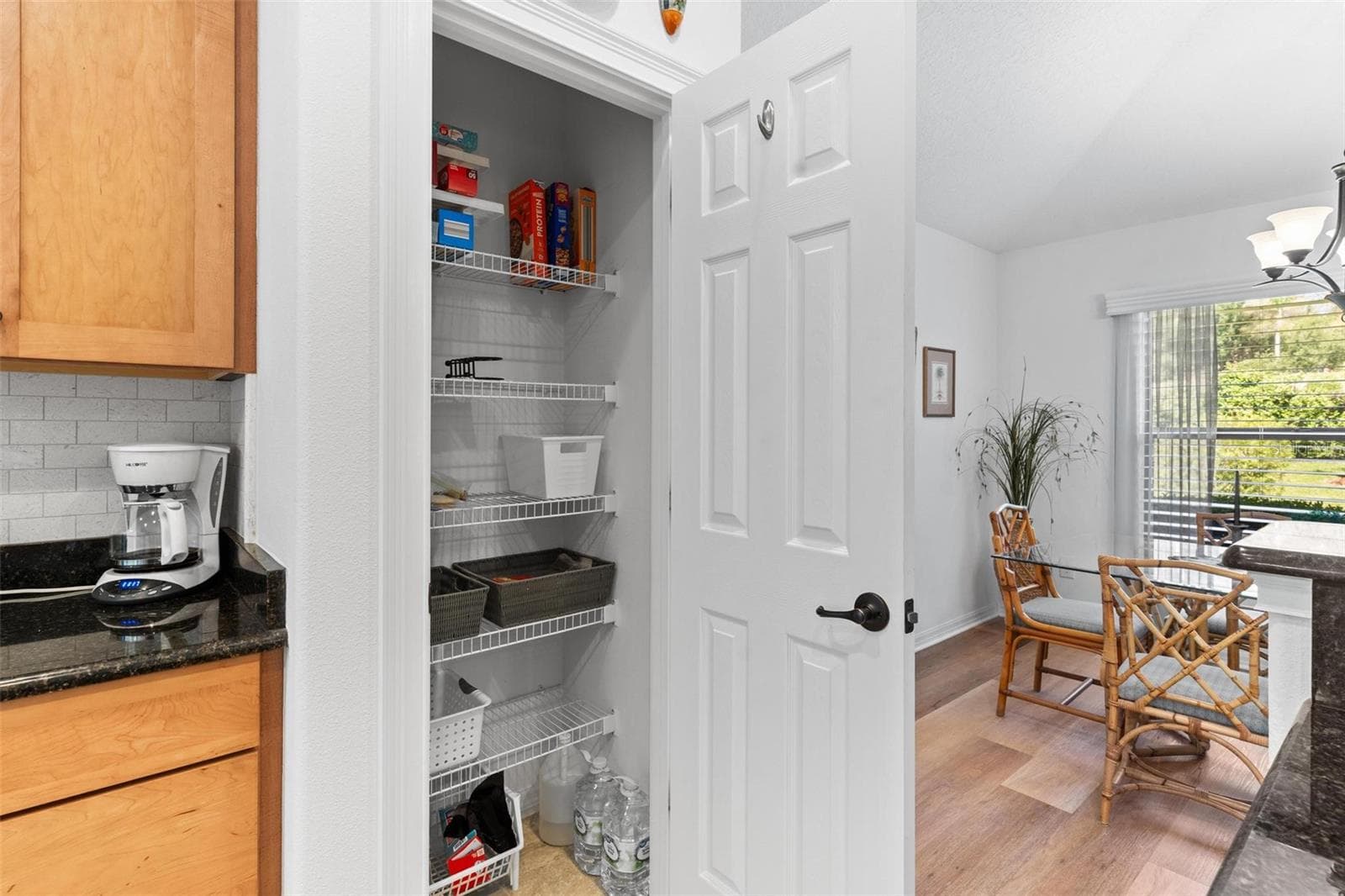 More storage in this closet pantry! - 6115 LANDINGS BLVD, LADY LAKE