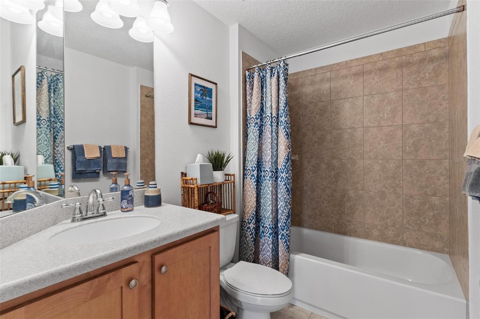 Stylish Guest Bath with raised vanity... - 6115 LANDINGS BLVD, LADY LAKE
