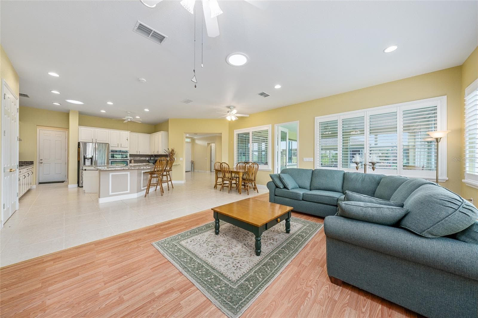 family room - kitchen staged - 13500 SE 97TH TERRACE RD, SUMMERFIELD