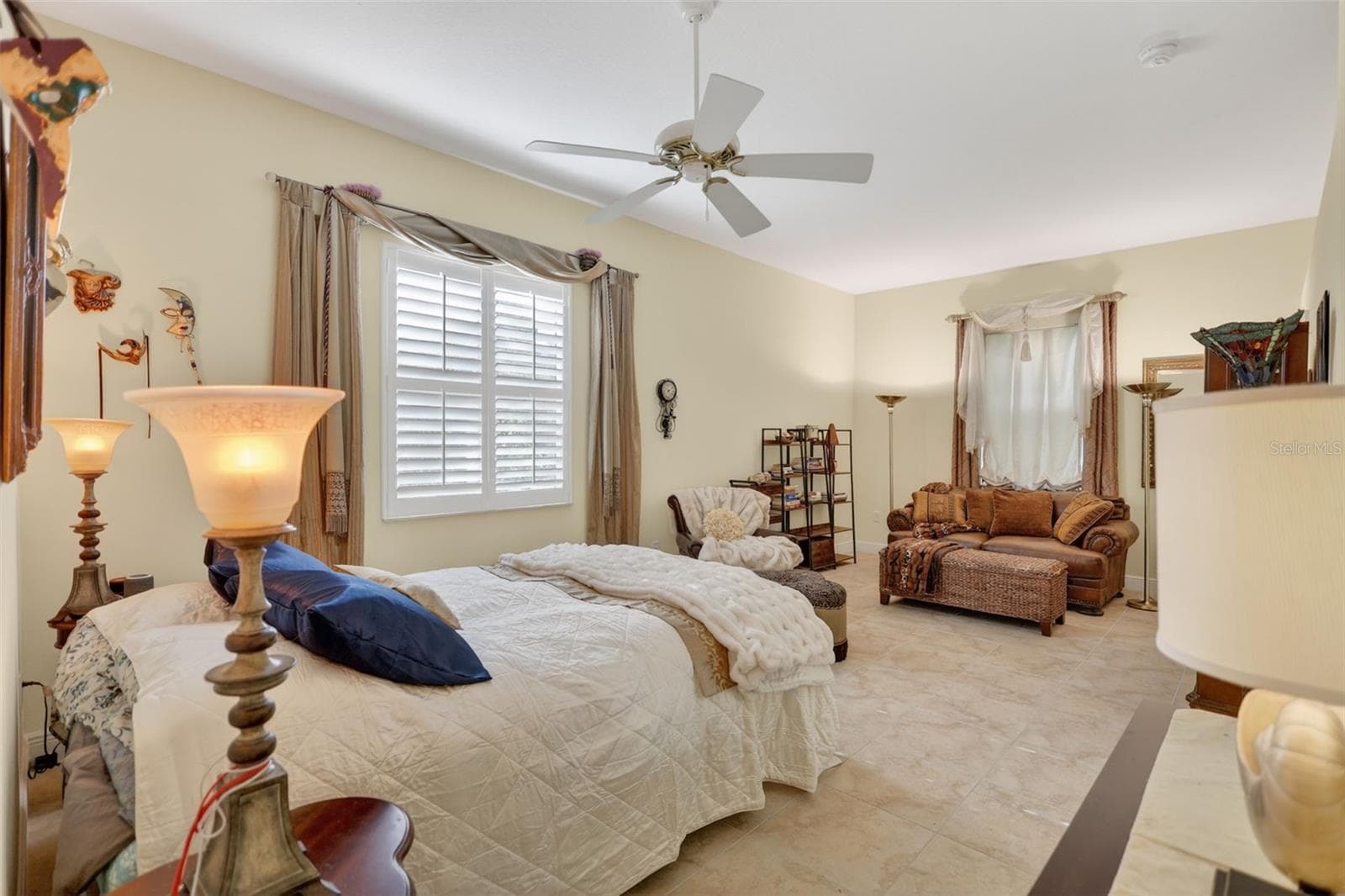 Generous guest retreat featuring an ensuite bath with direct pool access. - 1210 408TH CT E, MYAKKA CITY