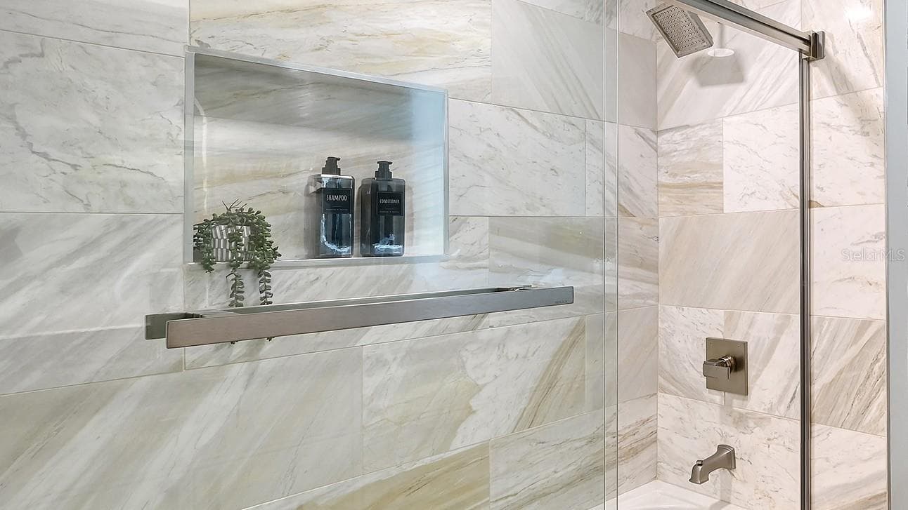 Tub Shower Combo in Guest Bathroom - 5880 MIDNIGHT PASS RD #907, SARASOTA