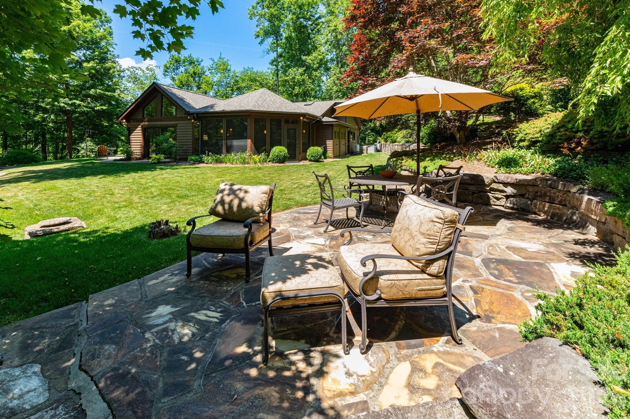 Multiple outdoor gathering spaces designed for entertaining, relaxing, and enjoying the serene mountain setting. - 29 Gardner Drive, Asheville