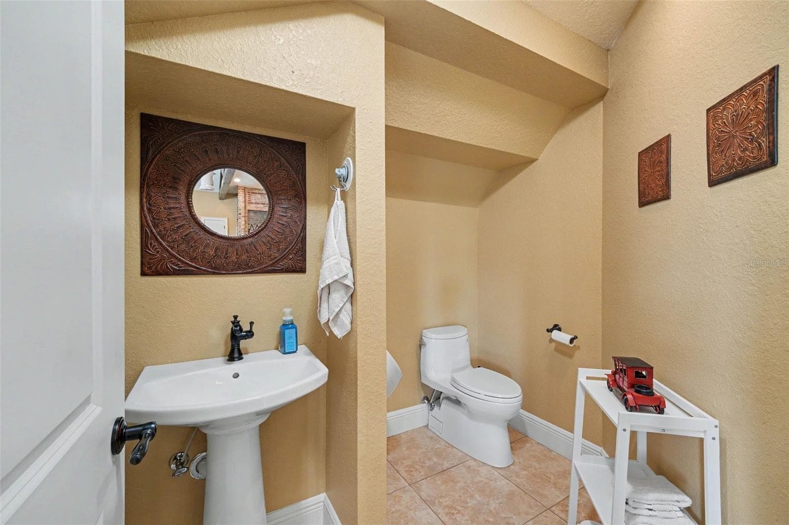 loft half bath with urinal - 2179 ARNOLD PALMER DR, TITUSVILLE