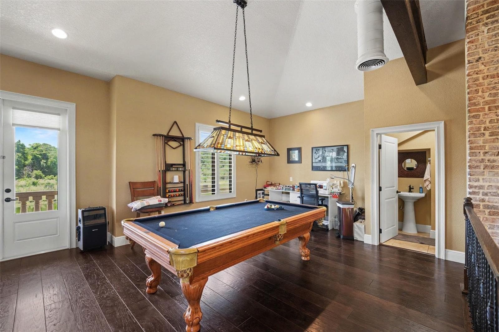 Upstairs loft game room with pool table which conveys - 2179 ARNOLD PALMER DR, TITUSVILLE