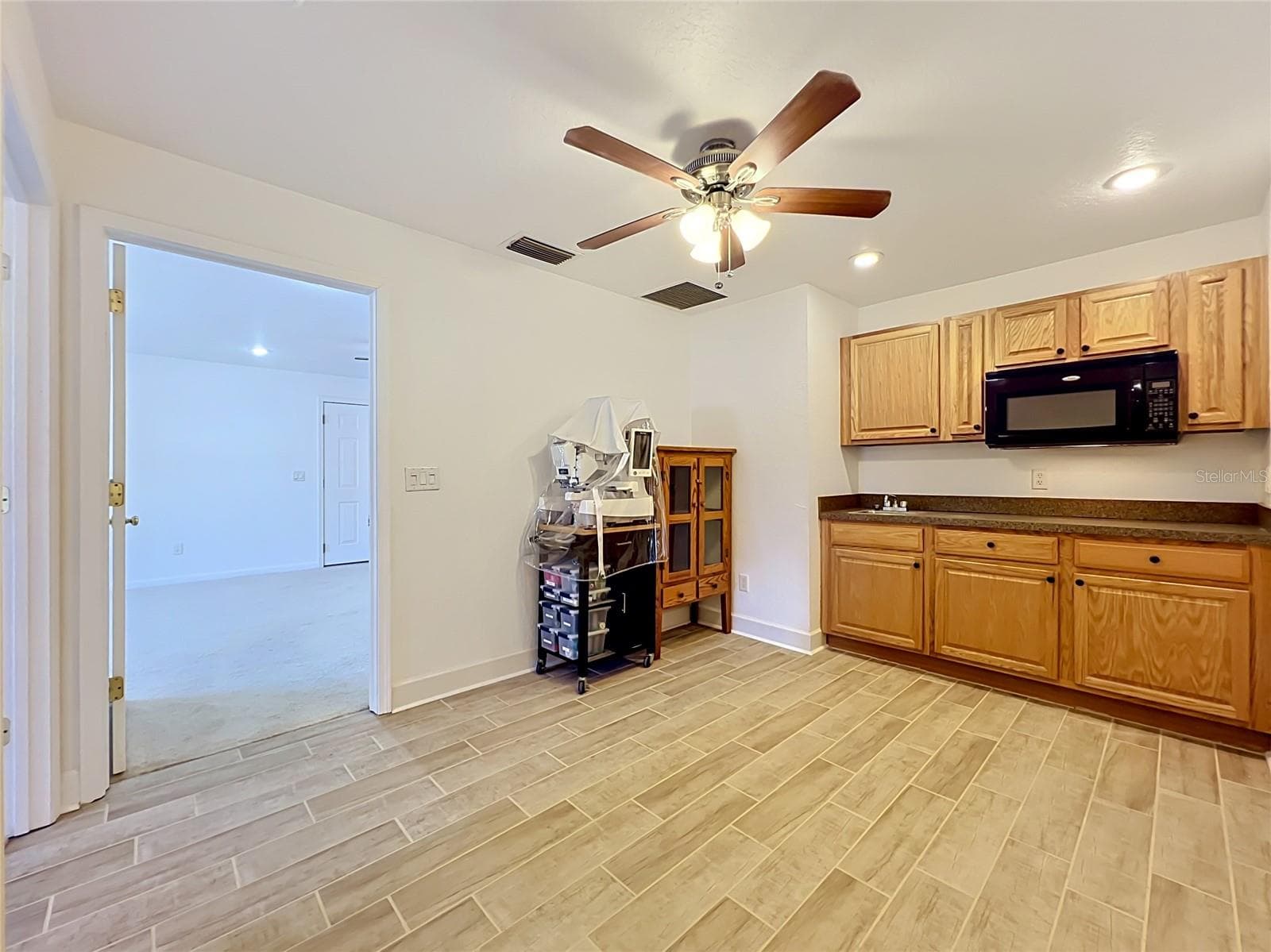 Left wing Kitchenette next to Bonus Room - 2300 PINE MEADOWS PL, CHULUOTA