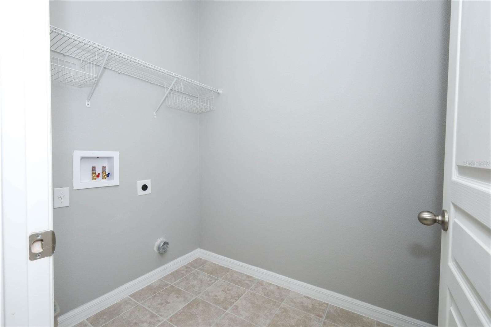 laundry room - 9175 CHANDLER DR, GROVELAND