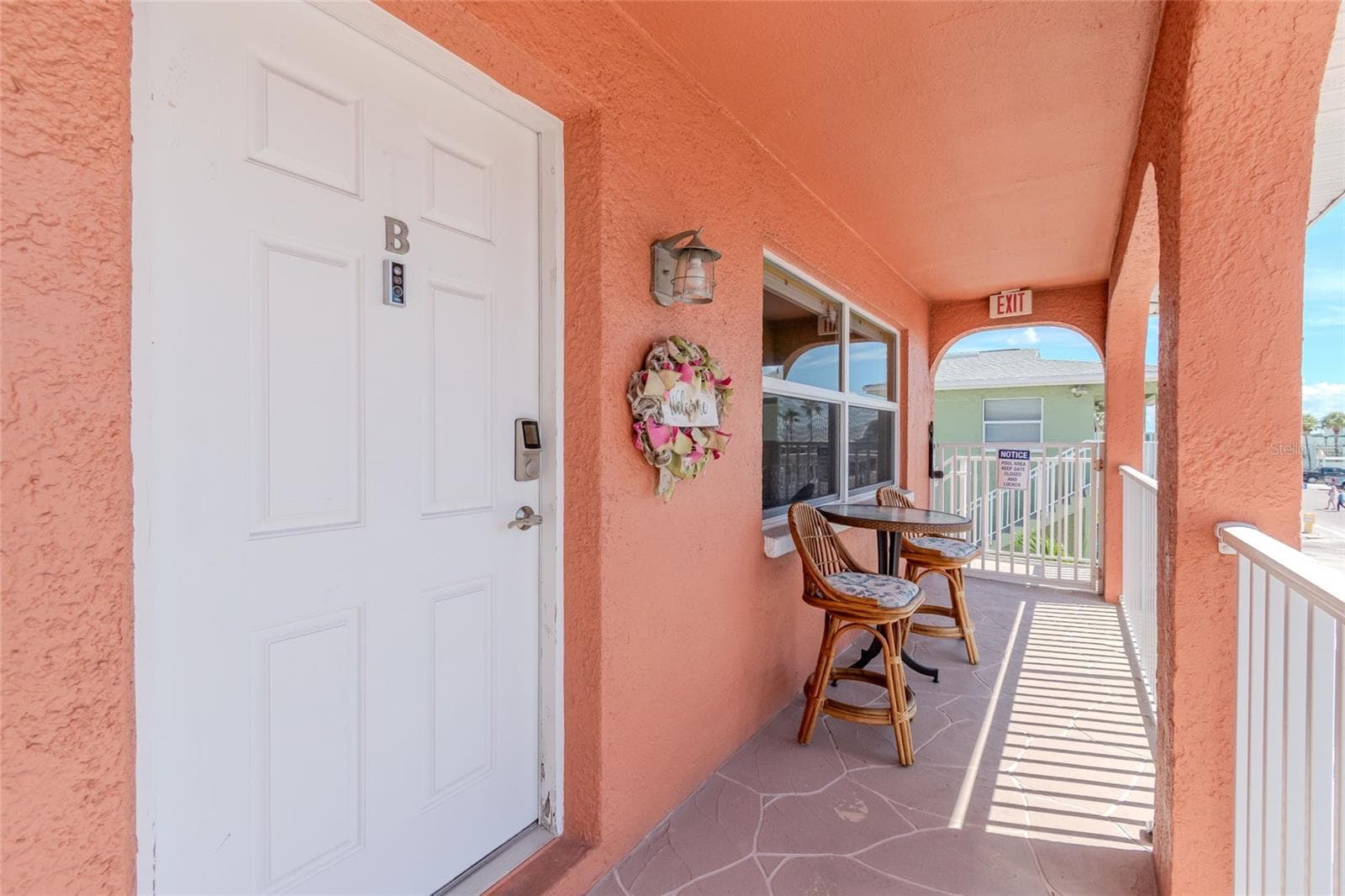 FRONT BALCONY/DOOR TO UNIT 1B - 5605 SHORE BLVD S #1B, GULFPORT