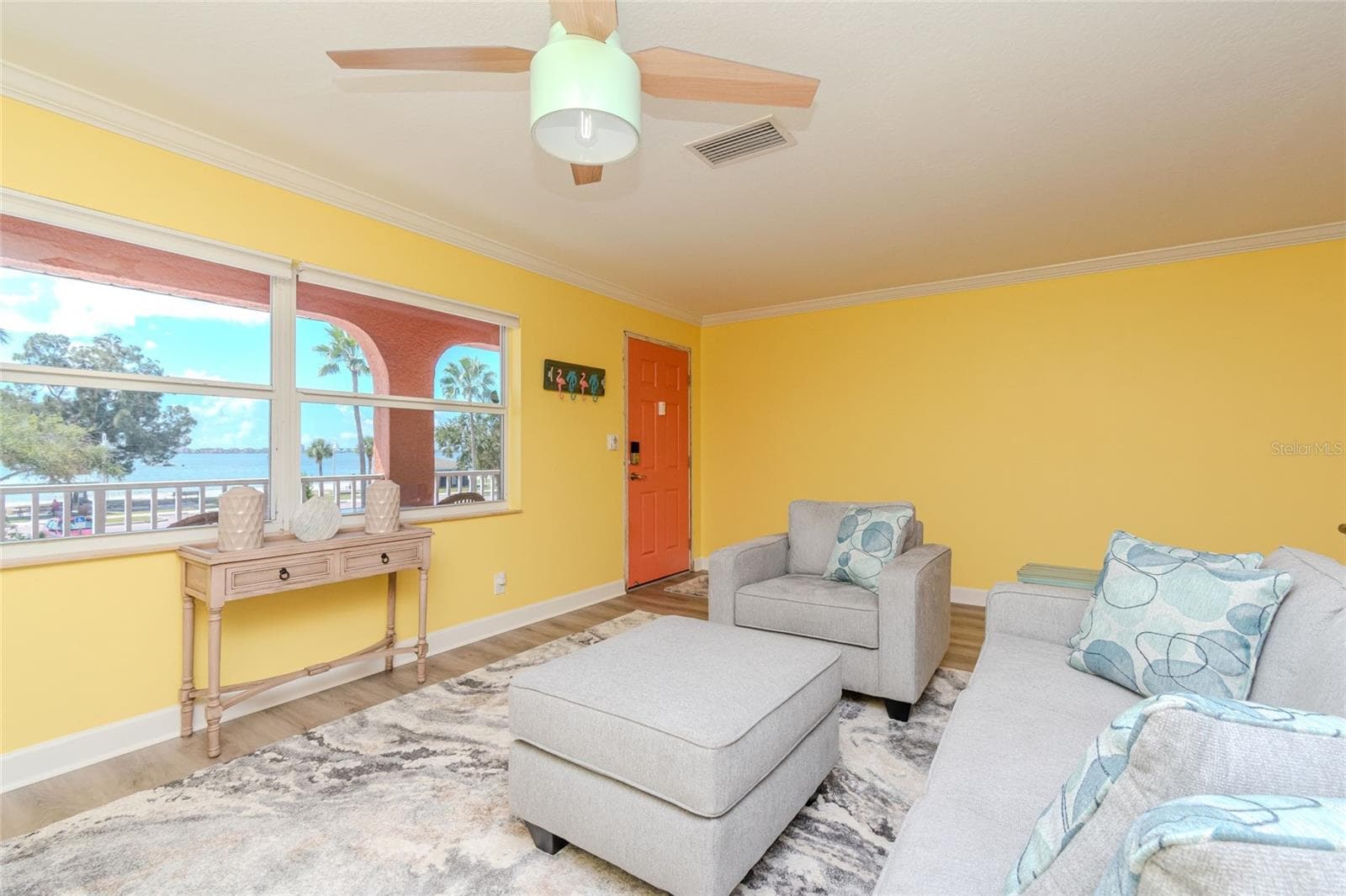 LIVING ROOM WITH VIEW OF WATERFRONT & PARK - 5605 SHORE BLVD S #1B, GULFPORT