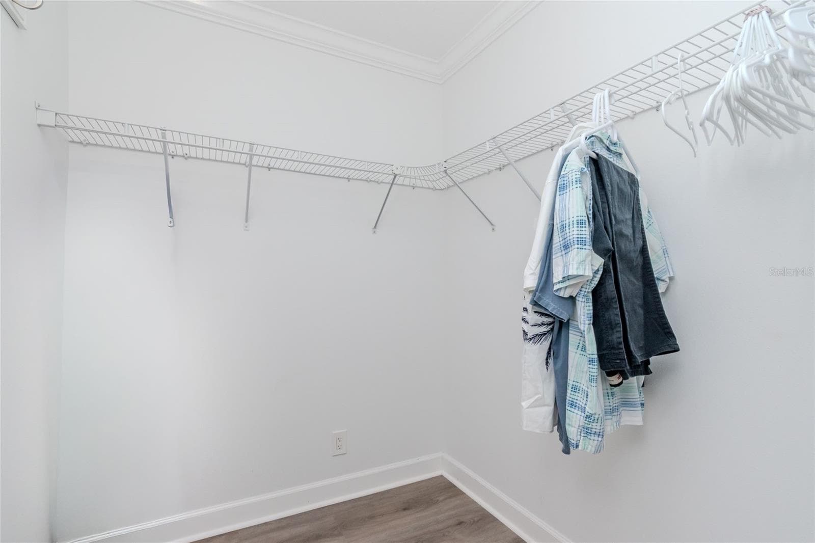 BIG WALK-IN CLOSET IN MASTER. - 5605 SHORE BLVD S #1B, GULFPORT