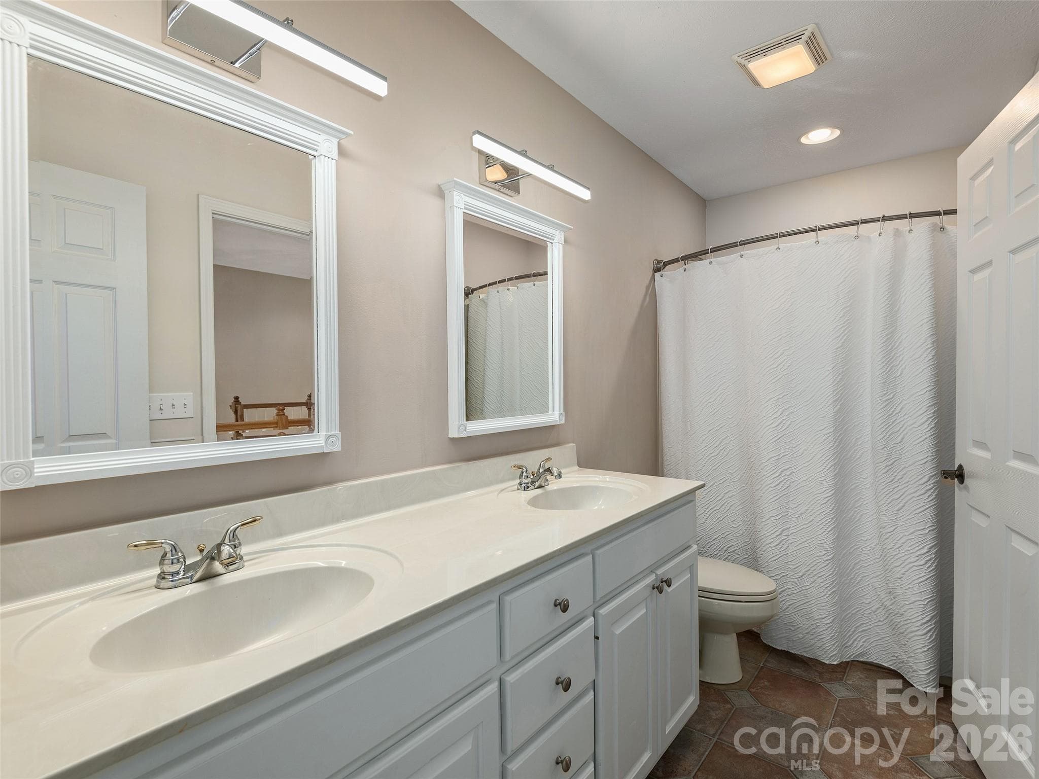 Guest bathroom on upper level with double vanity - 48 Smokemont Drive, Arden