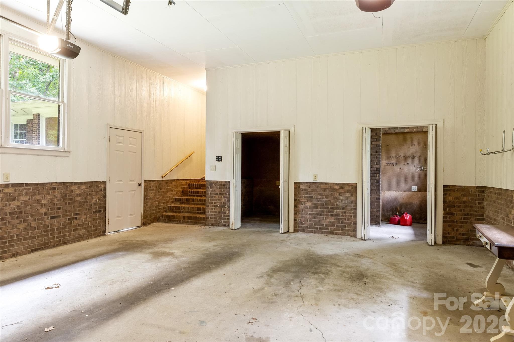 Oversized garage with workshop and storage areas - 2038 Skyway Drive, Monroe