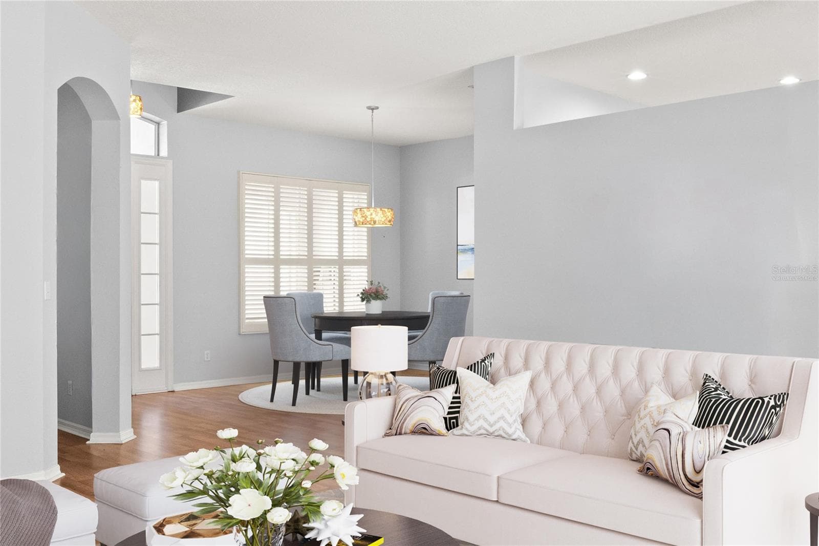 Virtually Staged - Living Room and Dining Room - 1305 CRYSTAL GREENS DR, SUN CITY CENTER