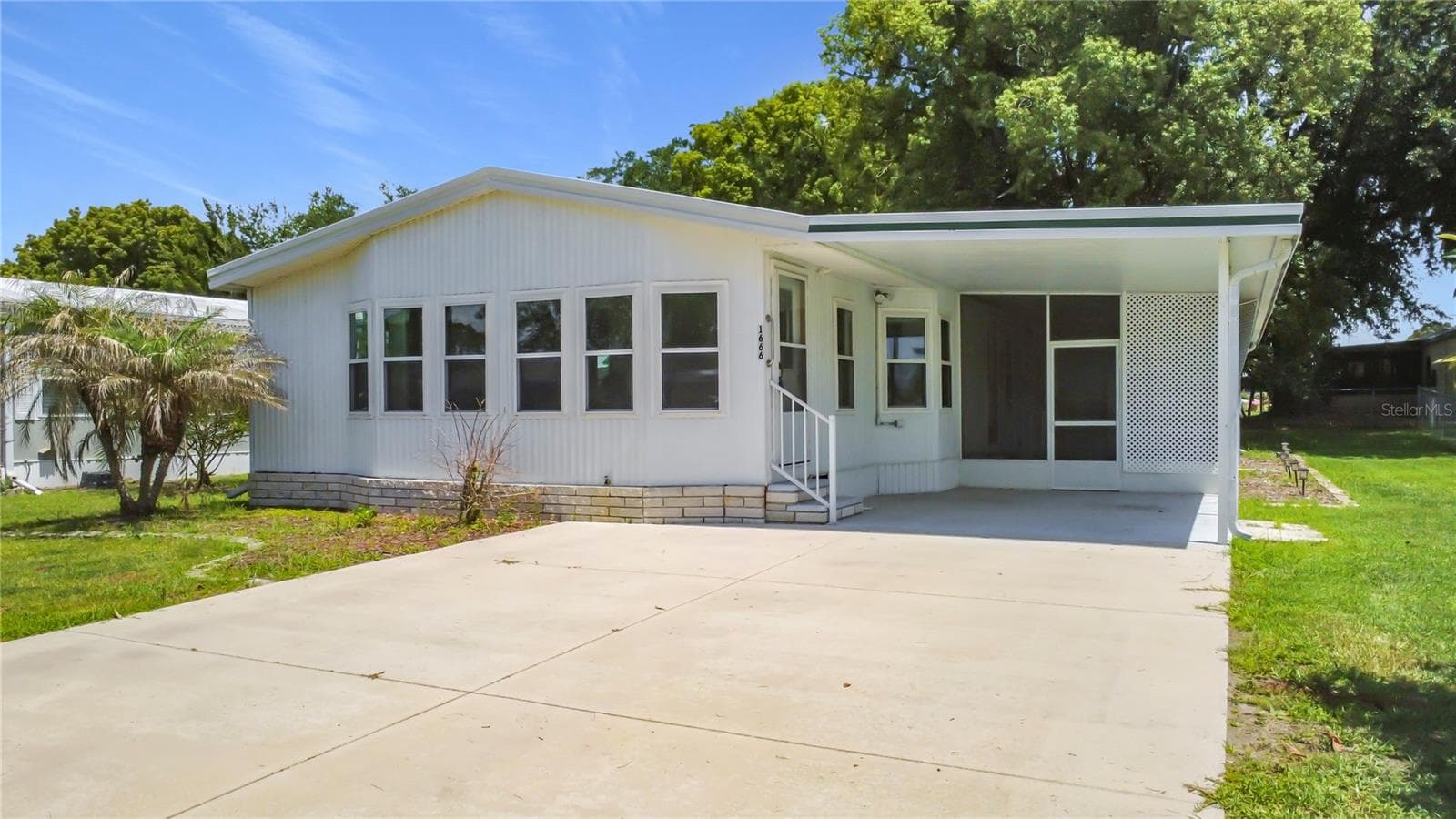 Carport and Parking Area - 1666 ELKHART CIR, TAVARES