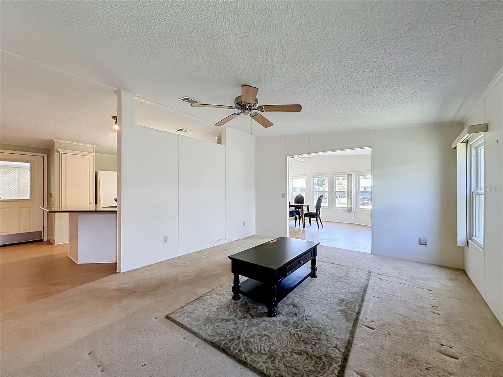 Living Room open to Kitchen and Dining Room - 1666 ELKHART CIR, TAVARES